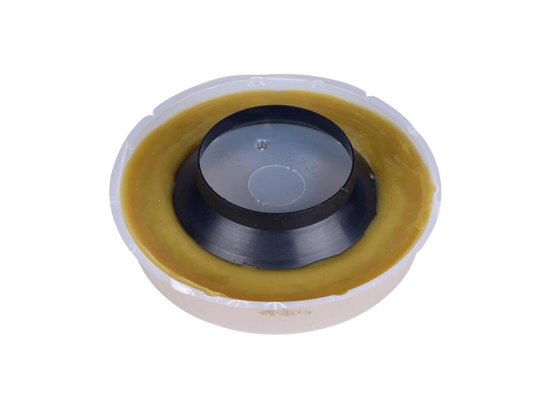 Yellow wax toilet bowl ring seal with black plastic insert in clear plastic container.