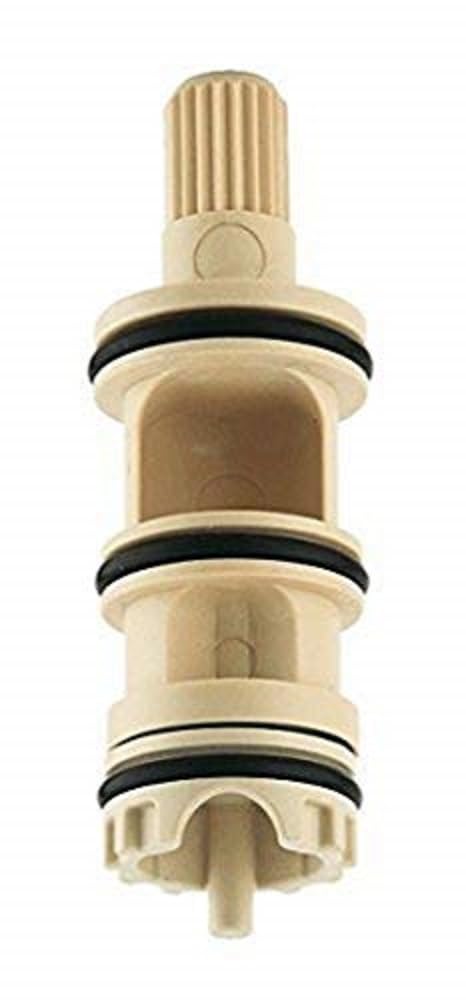 Grohe diverter cartridge with ribbed top stem, cream-colored body, black rubber seals, and notched base connection.