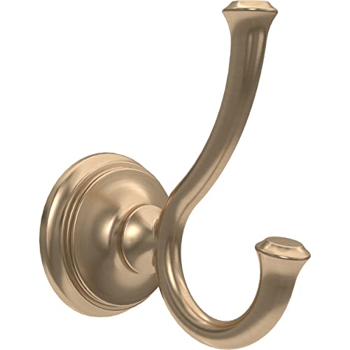 Champagne bronze double robe hook with curved arms extending from a circular wall-mounted base.