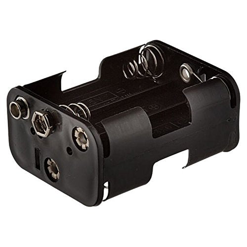 Black plastic battery box with spring contacts and solenoid terminals for AA batteries.
