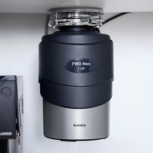 Black and stainless steel food waste disposal unit mounted under sink with "FWD Max 1 HP" label.