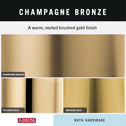 Champagne bronze towel bar with brushed finish and cylindrical metal rod.