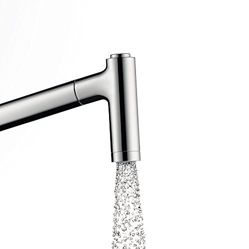 Hansgrohe Metris steel kitchen faucet with high-arc spout and pulldown spray head dispensing water.