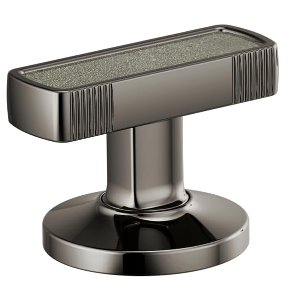 Chrome faucet handle with textured concrete inlay and vertical ribbed sides on circular base.