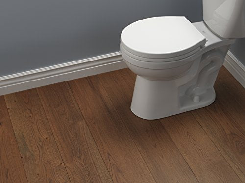 White round toilet seat with slow-close lid mounted on white ceramic toilet bowl.