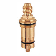 Brass thermostatic cartridge with grooved upper stem and black sealing rings on cylindrical body.