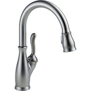 Chrome kitchen faucet with curved gooseneck spout, single lever handle, and pull-down spray head.