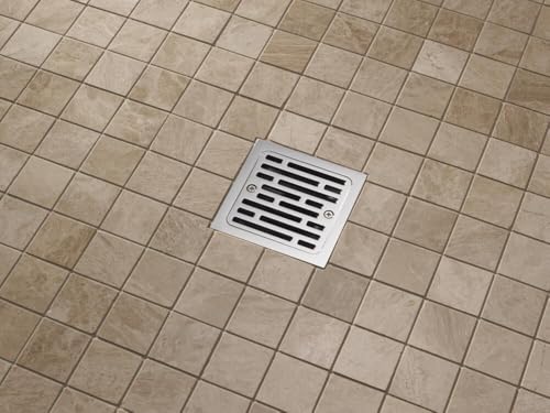Chrome square shower drain with horizontal slat grate installed in tile floor.