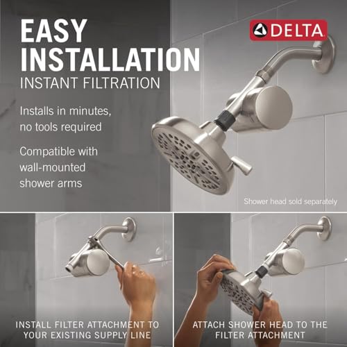 Brushed nickel shower filter attachment with round filter cartridge and mounting bracket for wall-mounted shower arms.