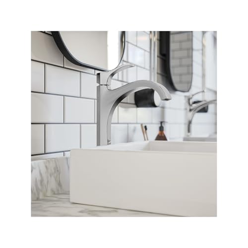 Chrome single-hole bathroom faucet with curved spout mounted on white rectangular sink.