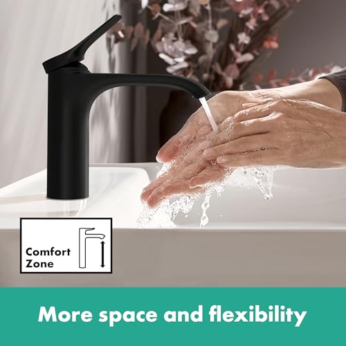 Matte black single-hole faucet with tall curved spout and pop-up drain, water flowing over hands at sink.