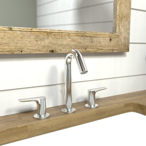 Chrome widespread bathroom faucet with curved spout and lever handles mounted on wooden vanity.