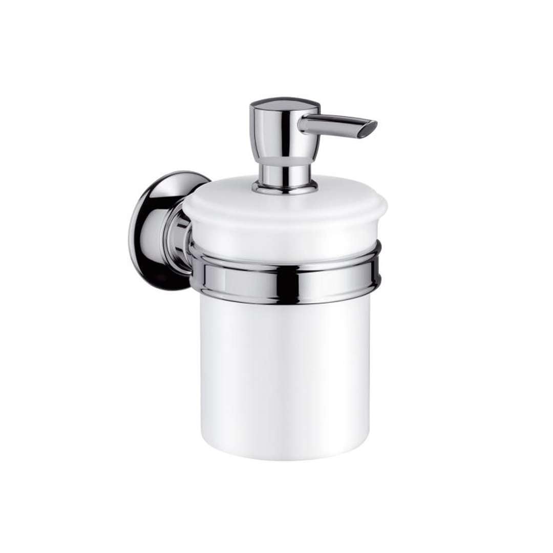 Chrome and white wall-mounted soap dispenser with cylindrical ceramic container and lever pump.