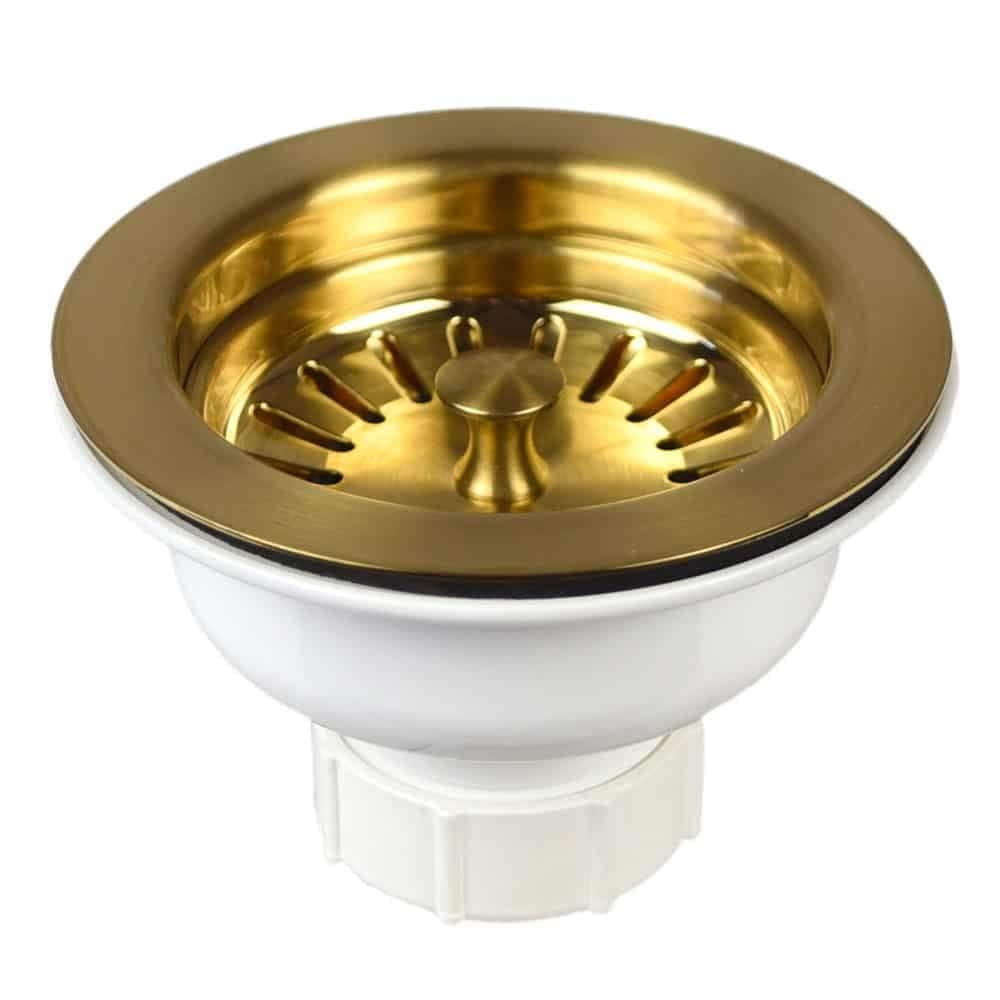 Brass basket strainer with radial slots and center post, white PVC body with threaded connection.