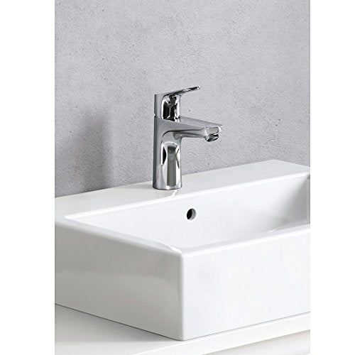 Chrome single-hole bathroom faucet with lever handle mounted on white rectangular sink basin.