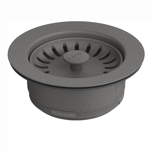 Gray round air switch button with radial slot pattern and center stem for garbage disposal activation.