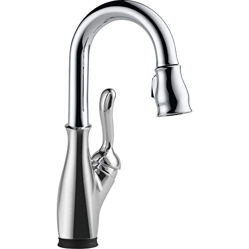 Polished chrome single-handle pull-down kitchen faucet with curved spout and touch-activated control lever.