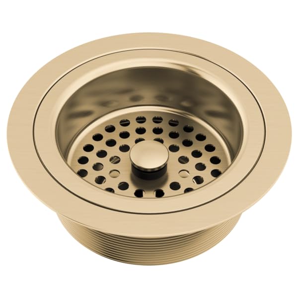 Champagne-colored kitchen sink flange and strainer with perforated basket and center post.