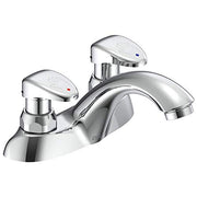 Chrome two-handle bathroom faucet with metering controls and curved spout.