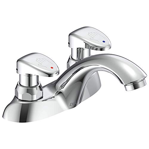 Chrome two-handle bathroom faucet with metering controls and curved spout.