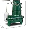 Green cast iron sewage pump with piggyback switch control box mounted on top and discharge port.