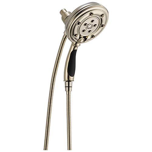 Round brushed nickel showerhead with multiple spray holes and black grip handle attached to flexible hose.