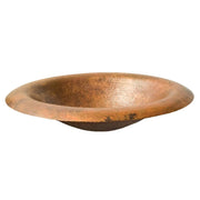Copper bathroom sink with wide lotus-shaped bowl and hammered finish surface.