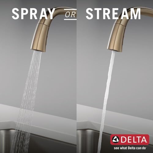 Champagne bronze pull-down kitchen faucet shown in spray and stream modes.