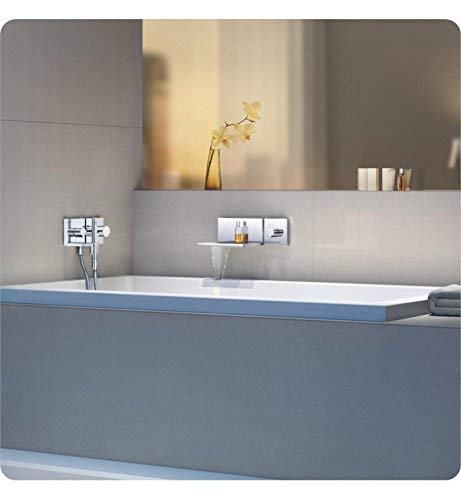 Chrome tub spout trim with rectangular escutcheon plate mounted on gray tile bathroom wall above bathtub.
