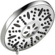 Chrome circular shower head with multiple spray jets arranged in concentric rings and an adjustable center dial.