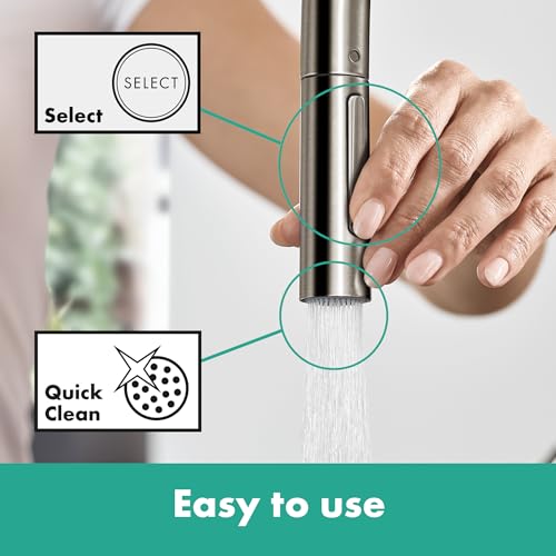 Chrome high-arc kitchen faucet with pull-down spray head held in hand, demonstrating select spray pattern and quick clean fea
