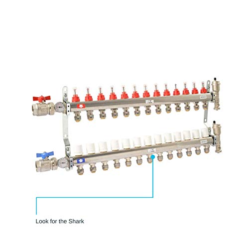 Brass push-to-connect end cap fitting, 1-1/4 inch diameter, mounted on radiant heating manifold assembly.