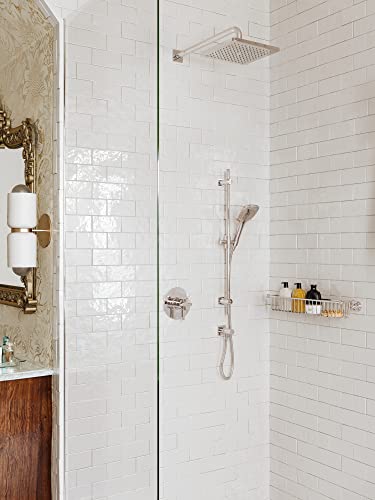 Satin nickel 4-inch handheld showerhead with 3-function settings mounted on shower wall with spray plate.