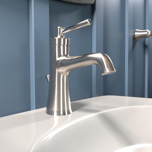 Brushed nickel single-hole bathroom faucet with curved spout and lever handle on white sink.