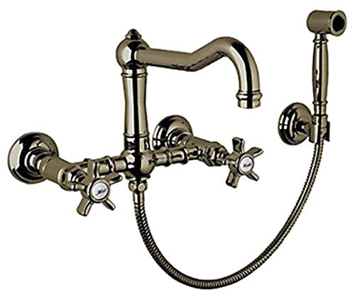 Tuscan brass wall-mount bridge kitchen faucet with curved spout, dual cross handles, and detachable sidespray.