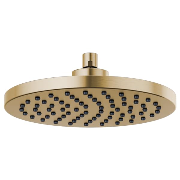 Round brass raincan shower head with multiple spray jets and ceiling mount arm.
