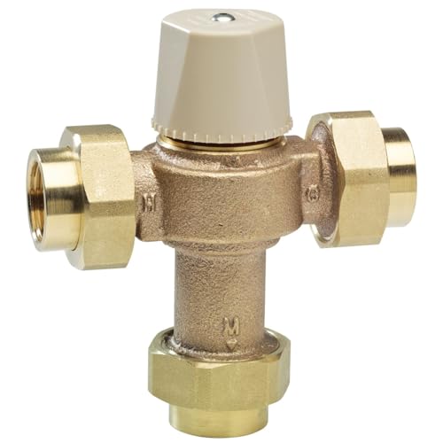 Brass thermostatic mixing valve with cream-colored adjustment cap and threaded union connections on both sides.