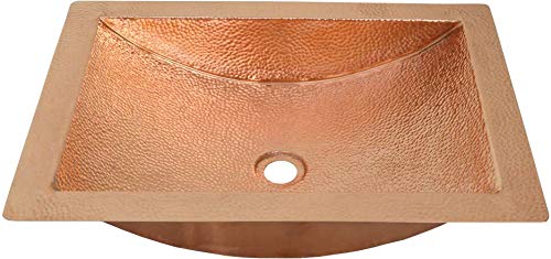 Polished copper rectangular sink with textured surface and single drain hole.