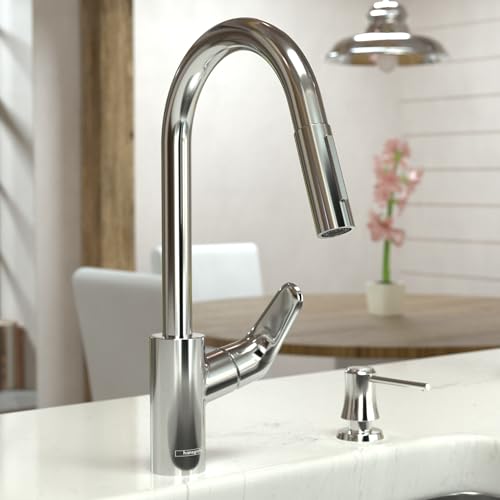 Chrome pull-down kitchen faucet with high arc spout and matching soap dispenser on white sink.