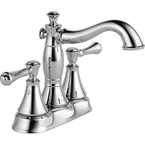 Chrome bathroom faucet with two handles, curved spout, and decorative bell-shaped bases.