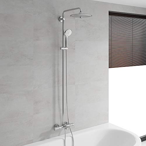 Chrome thermostatic shower system with overhead rainshower head, handheld showerhead, and vertical rail mounted on bathroom w