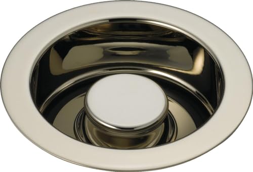 Stainless steel sink flange with chrome stopper and rubber gasket for garbage disposal installation.