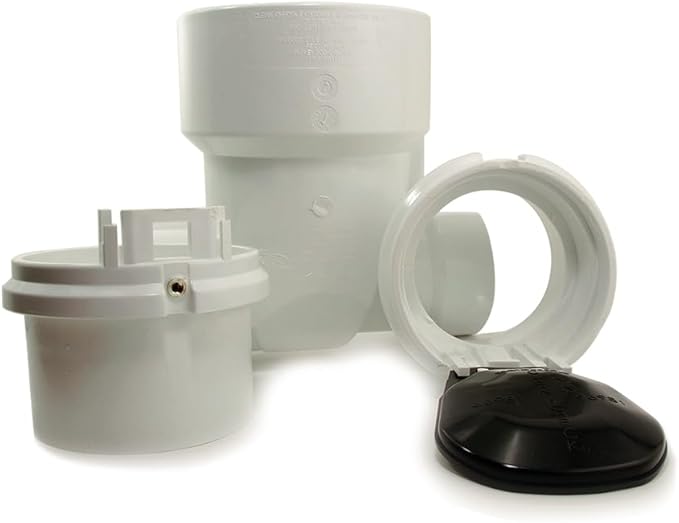 White PVC backwater check valve with removable components including black flapper disc, clear adapter ring, and cylindrical h