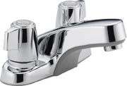 Chrome two-handle bathroom faucet with rounded spout and circular handles on wide base.