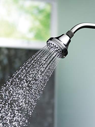 Chrome shower head with curved arm dispensing multiple water streams in massage spray pattern.