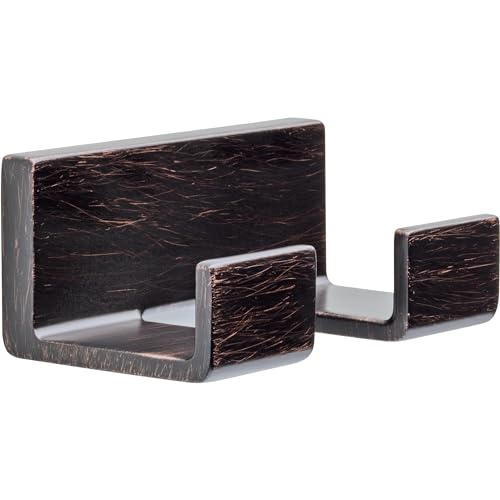 Oil-rubbed bronze double robe hook with textured finish and two hanging arms.