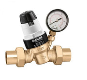 Brass pressure relief valve with black and white adjustment cap and attached pressure gauge showing PSI reading.