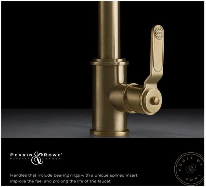 Unlacquered brass pull-down bridge kitchen faucet with cylindrical spout and single lever handle.