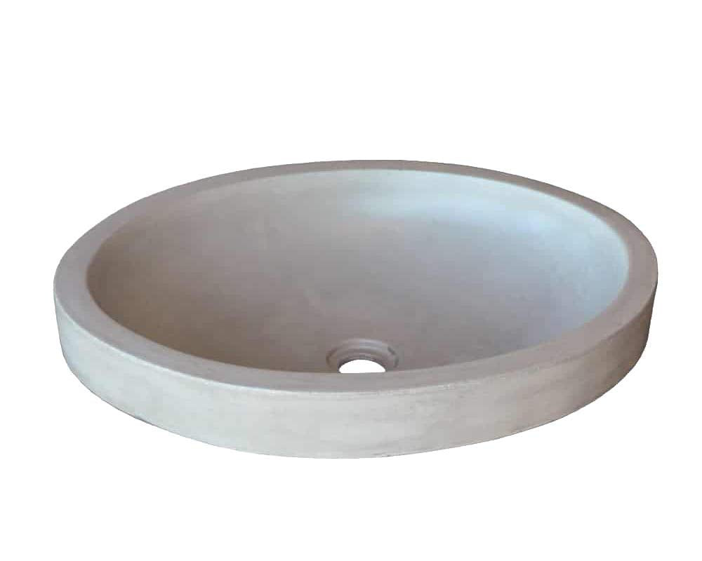 Oval concrete bathroom sink with ash finish and single drain hole.