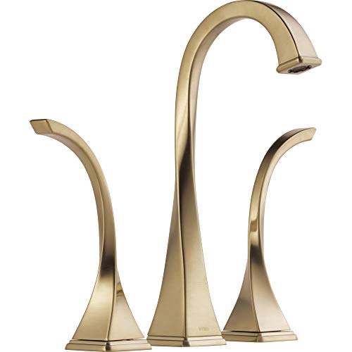 Champagne bronze widespread vessel faucet with tall curved spout and two curved side handles.